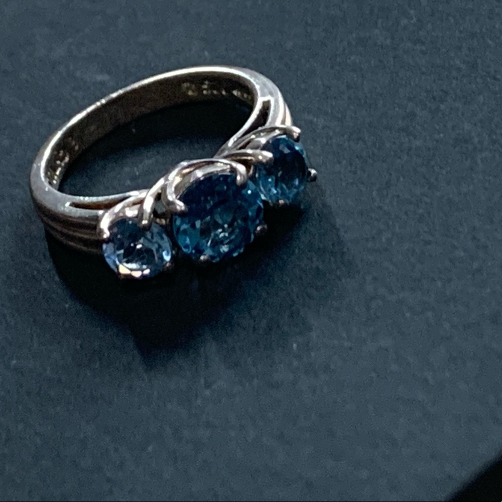 Silver ring with blue stone
